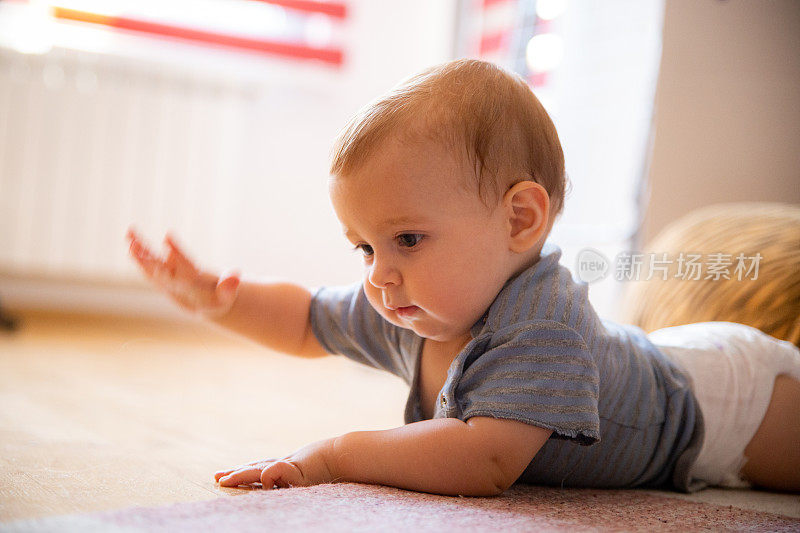 Cute baby playing on the floor